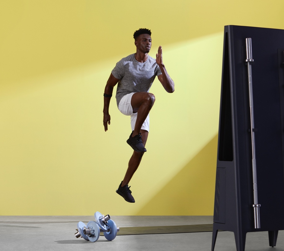 Person dancing on yellow background